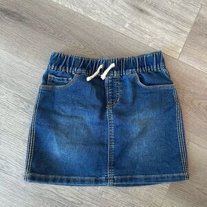 3/20$ Girls denim jean mini skirt size M(7-8)
